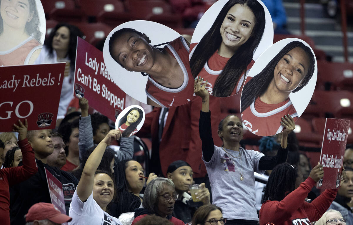 The UNLV Lady Rebels fan section cheers for their team during the first half of a Mountain West ...