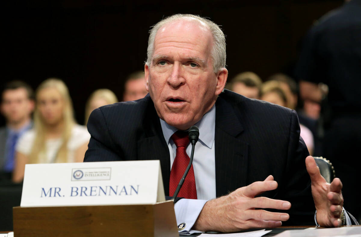 FILE - CIA Director John Brennan testifies before the Senate Intelligence Committee hearing on ...