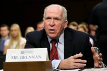 FILE - CIA Director John Brennan testifies before the Senate Intelligence Committee hearing on ...