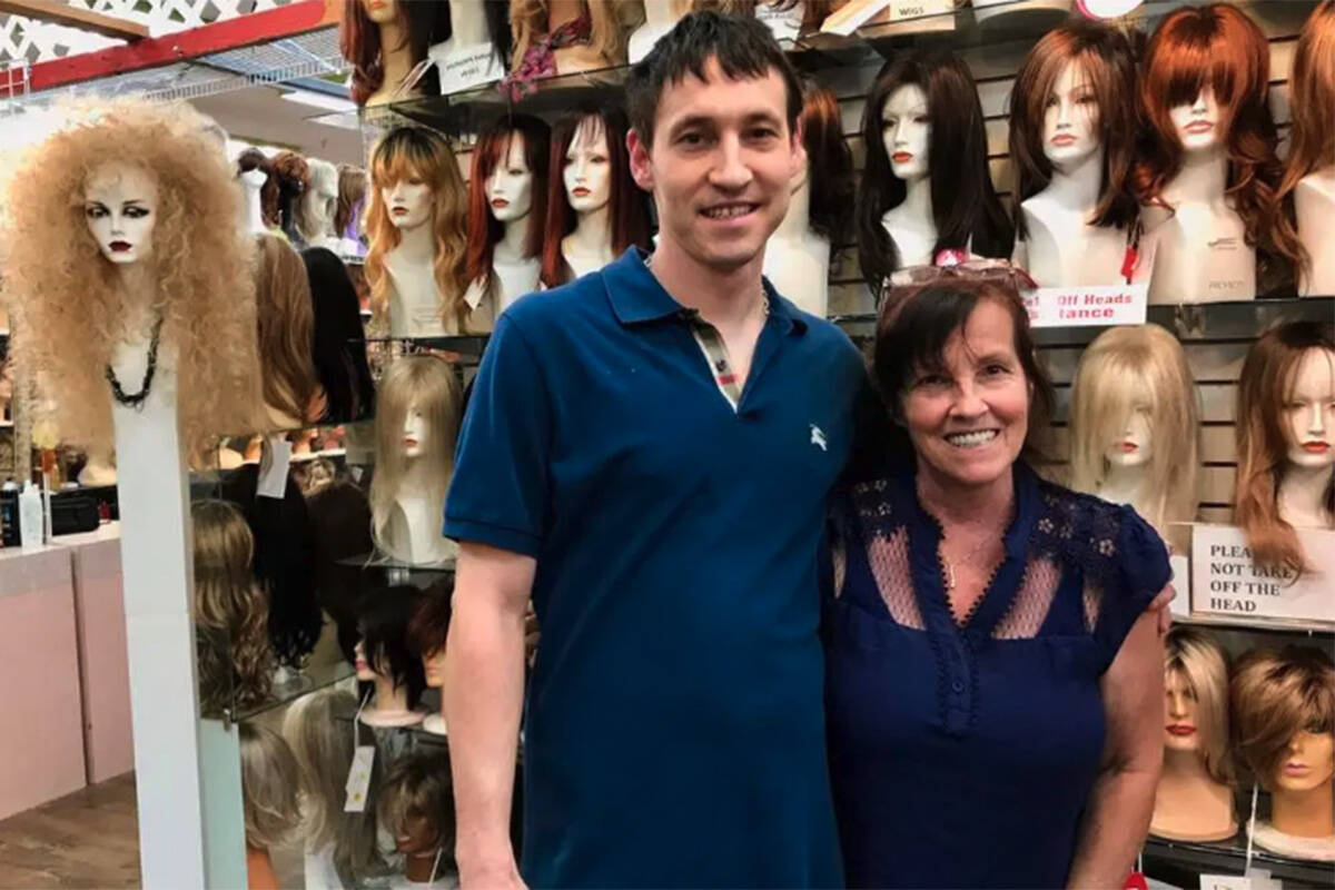Brandon Dillard, shown with his mother, Susan Schneider, in 2017, was charged in connection wit ...
