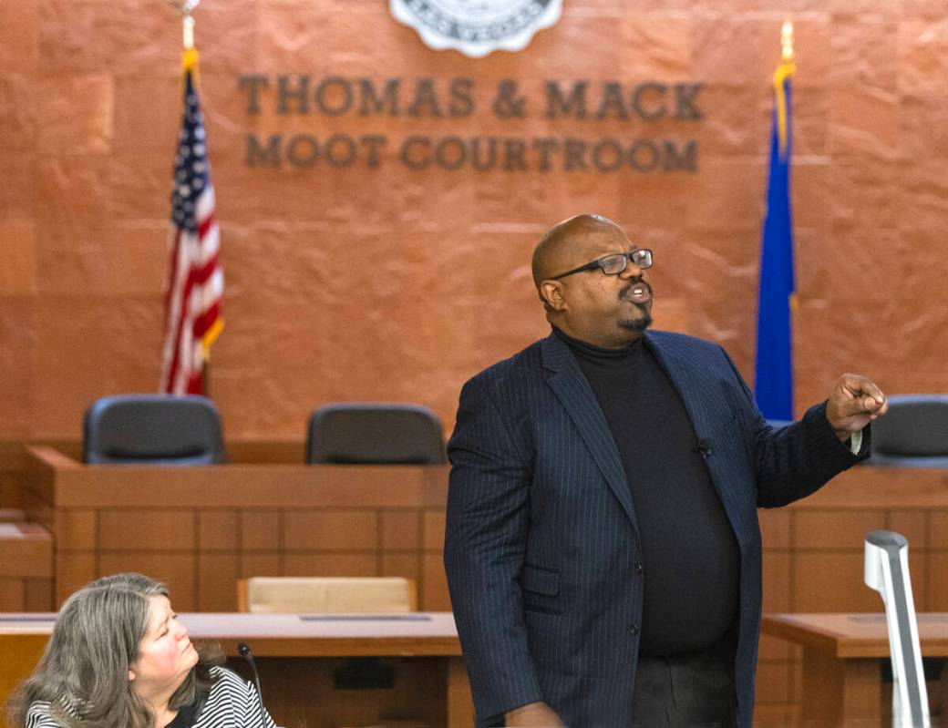 Judge Richard Boulware II speaks as JoNell Thomas, left, the Clark County special public defend ...