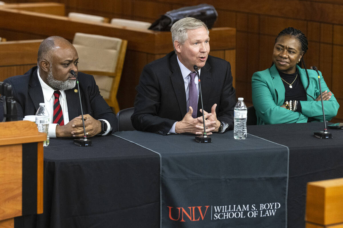 Jason Frierson, left, United States attorney for the District of Nevada, and Belinda Harris, ri ...