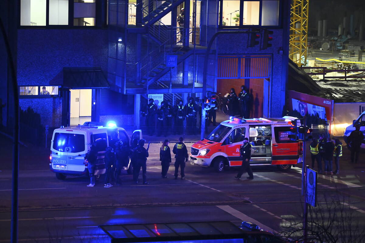 Armed police officers near the scene of a shooting in Hamburg, Germany, on Thursday, March 9, 2 ...