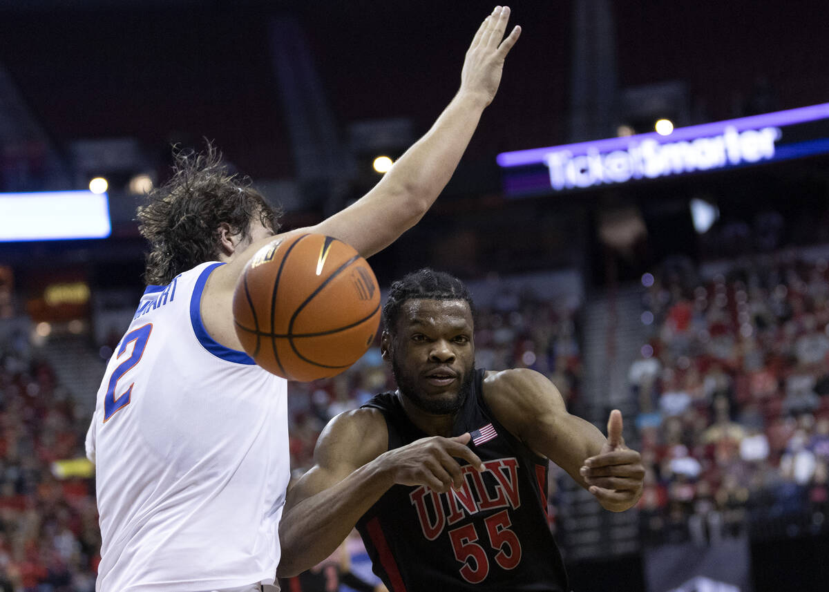 UNLV Rebels guard EJ Harkless (55) loses control of the ball while dribbling around Boise State ...