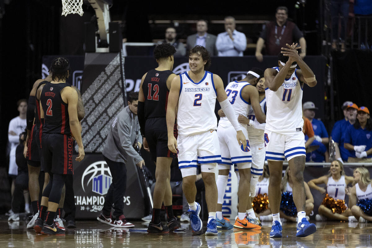 The Boise State Broncos celebrate after referees called a foul on the UNLV Rebels during the fi ...