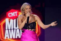Iliza Shlesinger presents the award for collaborative video of the year at the CMT Music Awards ...