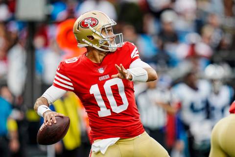 San Francisco 49ers quarterback Jimmy Garoppolo (10) prepares to pass during an NFL football ga ...