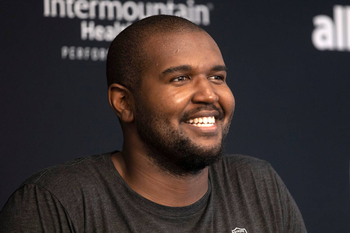 Raiders offensive tackle Brandon Parker smiles during a news conference following the team  ...
