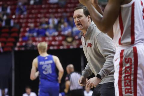 UNLV head coach Kevin Kruger shouts to his team during the second half of a basketball game aga ...