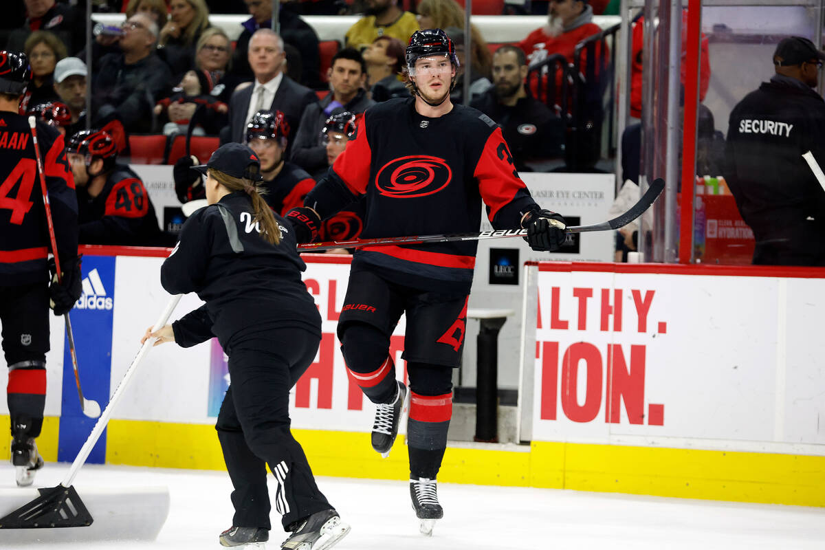 Carolina Hurricanes' Andrei Svechnikov (37) stretches his leg during a timeout in the second pe ...
