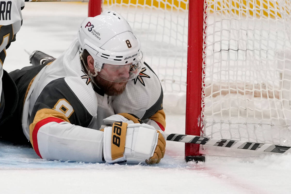 Vegas Golden Knights' Phil Kessel keeps a puck out of the net during the second period of an NH ...