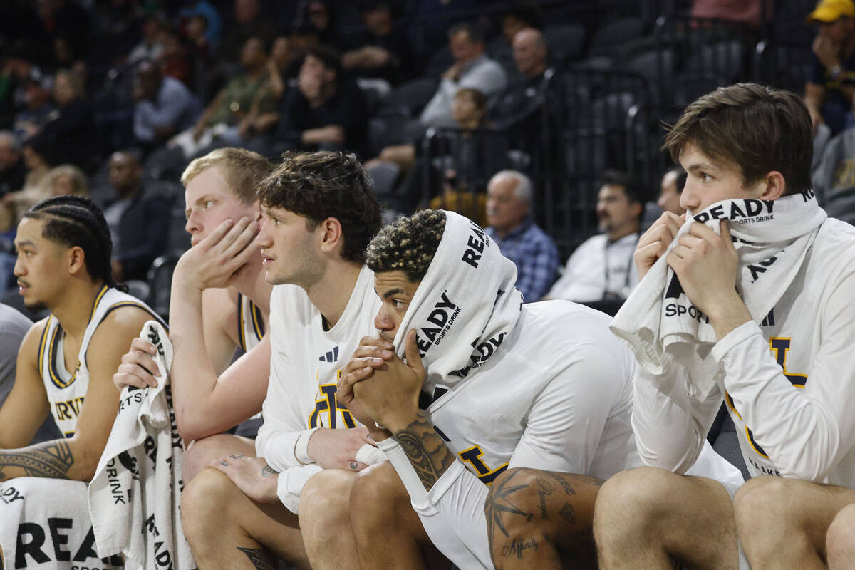 UC Irvine Anteaters players watch their teammates during the second half of an NCAA college bas ...
