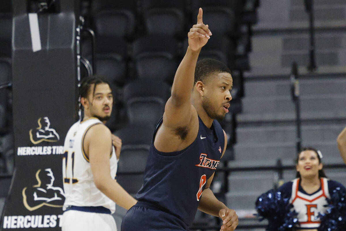 Cal State Fullerton Titans guard Jalen Harris (0) gestures after shooting a free throw during t ...