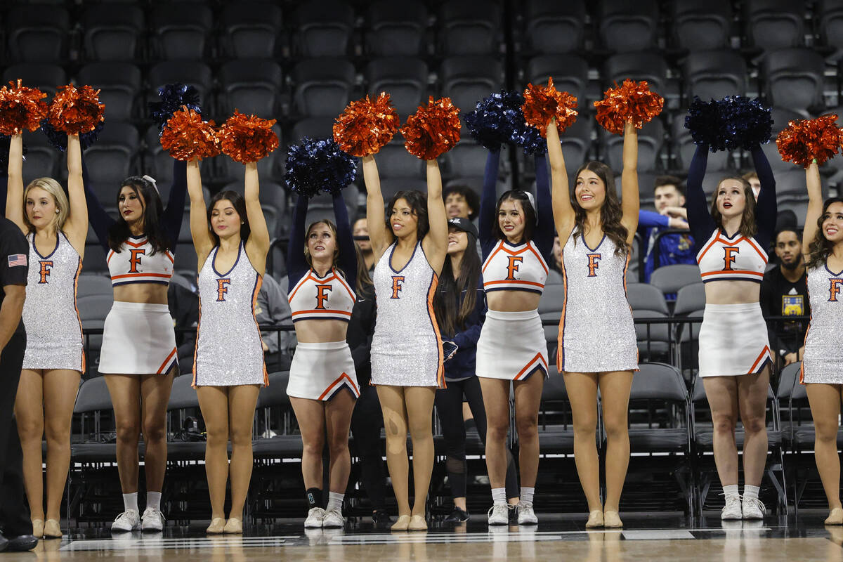 Cal State Fullerton Titans cheerleaders perform during the second half of an NCAA college baske ...