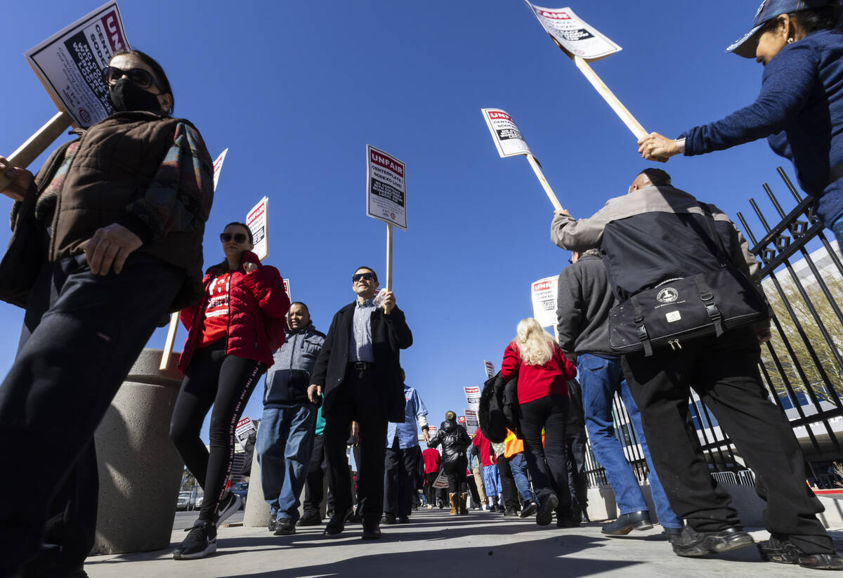 Culinary Union workers picket in front of the Las Vegas Convention Center, on Thursday, Feb.16, ...