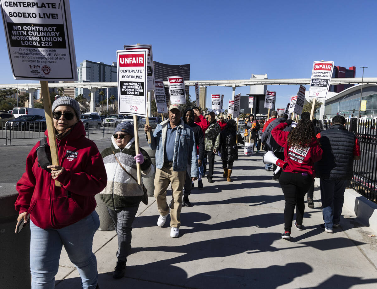 Culinary Union workers picket in front of the Las Vegas Convention Center, on Thursday, Feb.16, ...