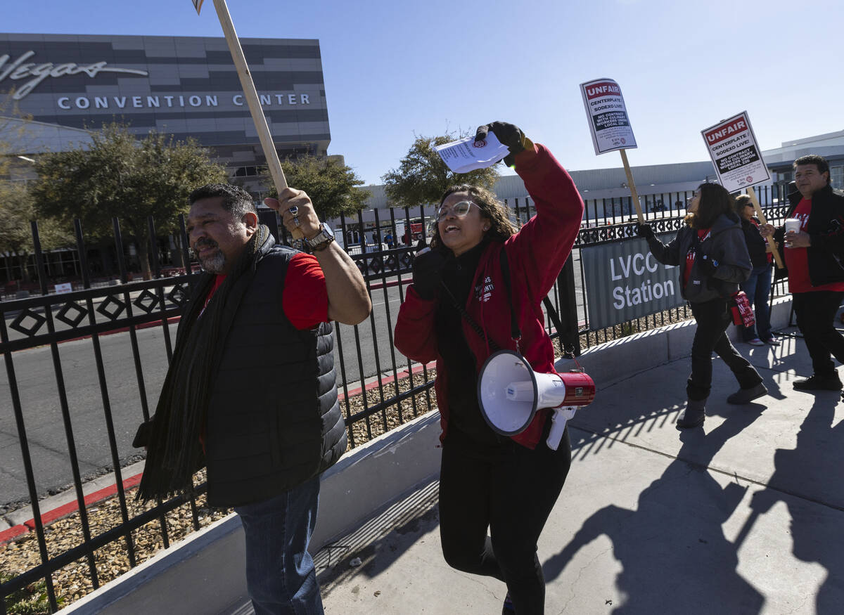 Diamante Asberry, a researcher at Culinary Union Local 226, shouts slogans as Culinary Union wo ...