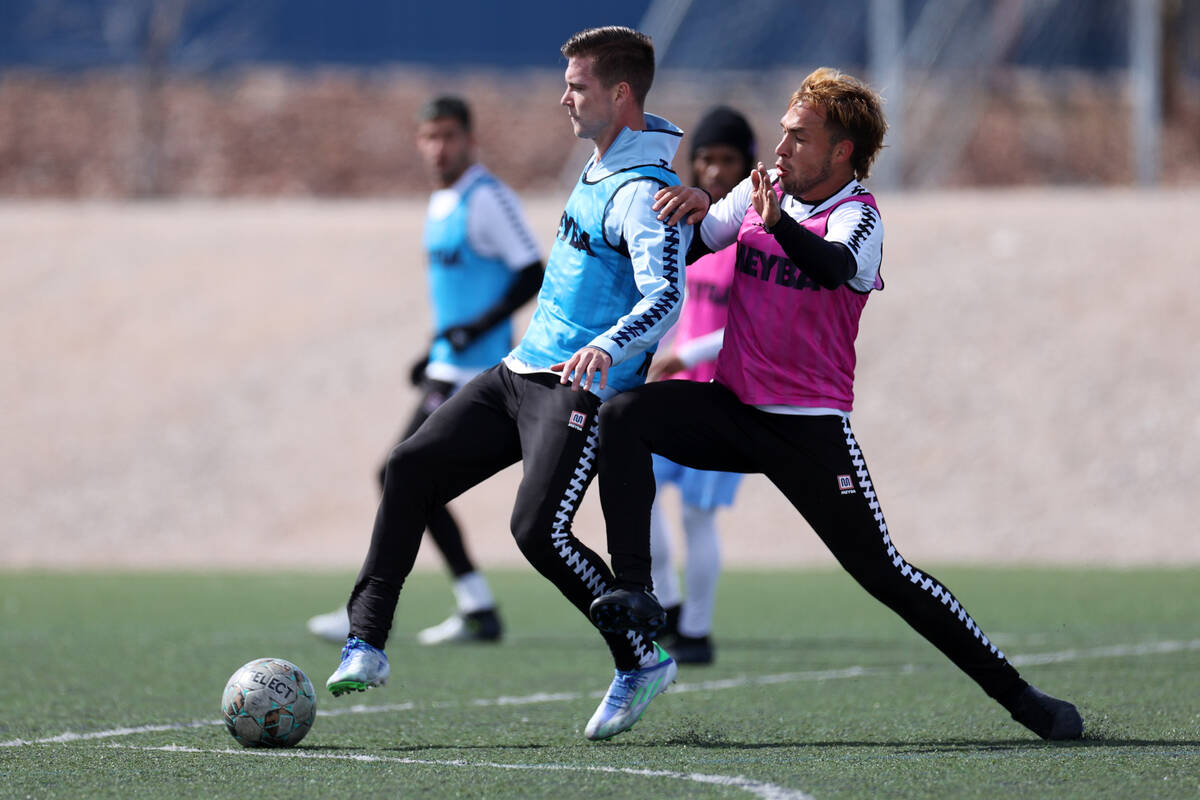 Jacob Bushue, left, wins the ball under pressure from Andres Jimenez during a Las Vegas Lights ...