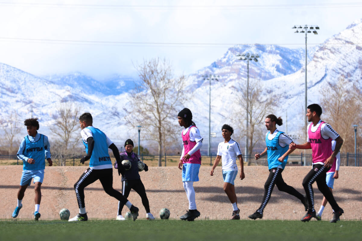 Players pass the ball during a Las Vegas Lights FC soccer practice at the Kellogg-Zaher Soccer ...