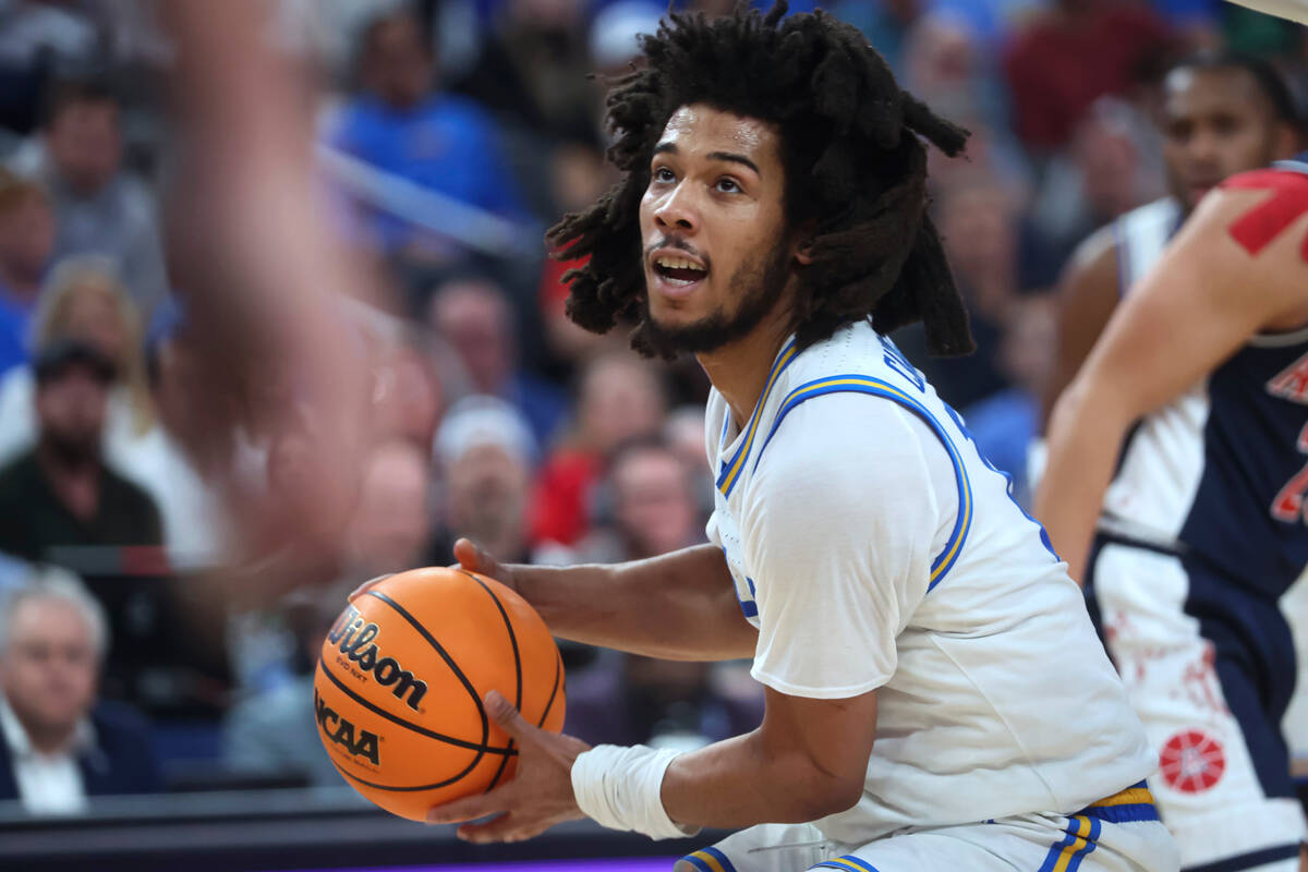 UCLA guard Tyger Campbell looks to shoot against Arizona during the second half of an NCAA coll ...