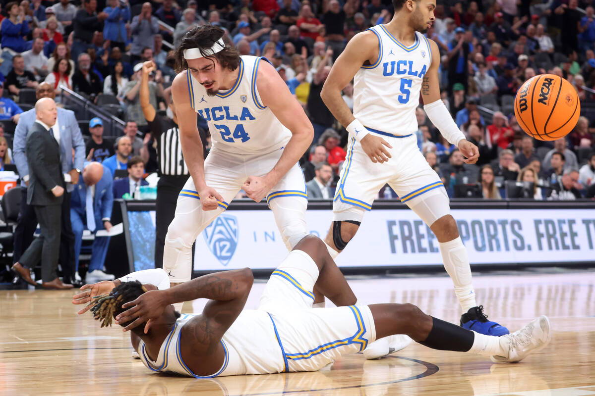 UCLA guard Jaime Jaquez Jr. (24) reacts after an Arizona player was called for an offensive fou ...