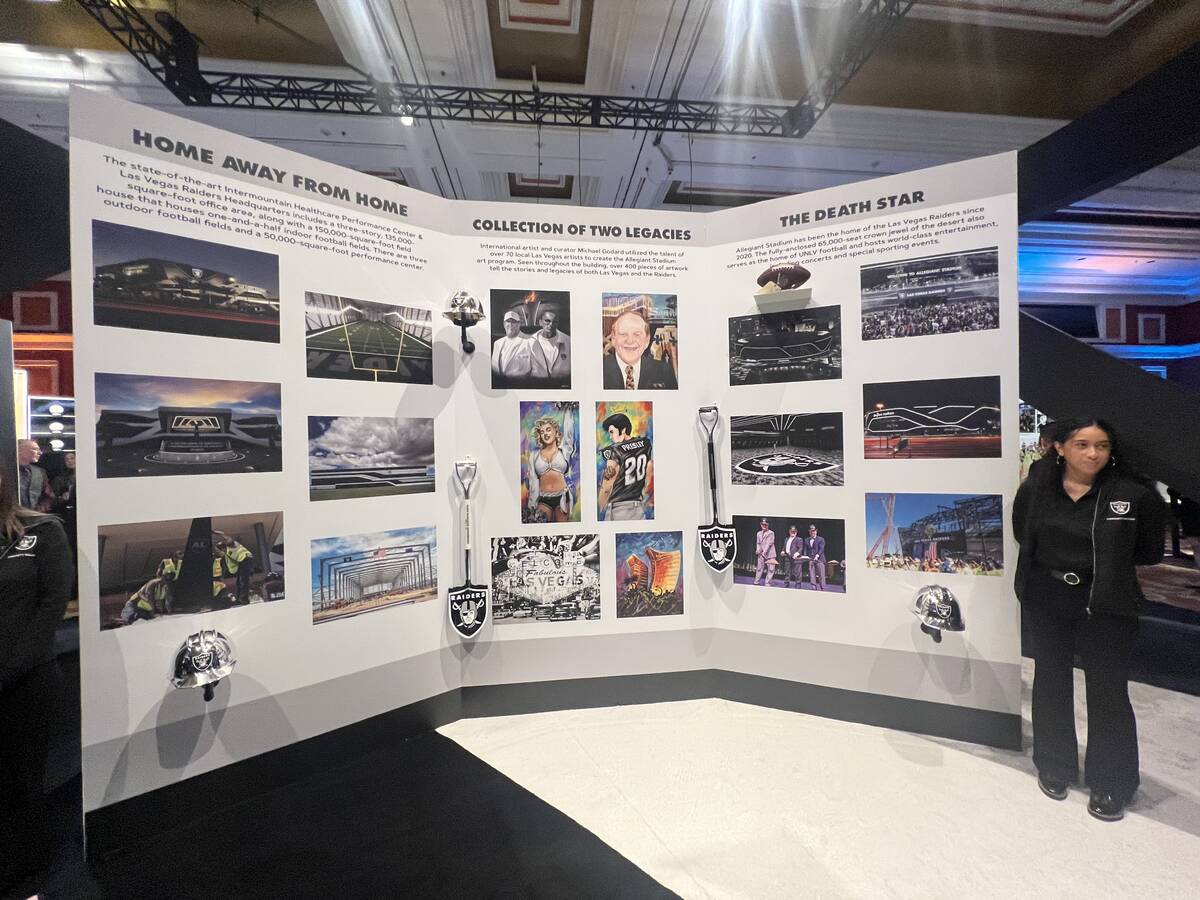 A photo exhibit of key moments in the Raiders move to Las Vegas is shown at the Adelson Educati ...