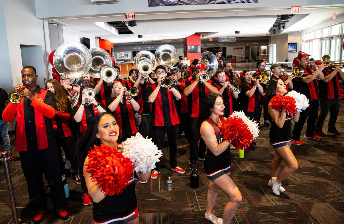 UNLV band and cheer members perform after the tournament seeding and opponent for the Lady Rebe ...