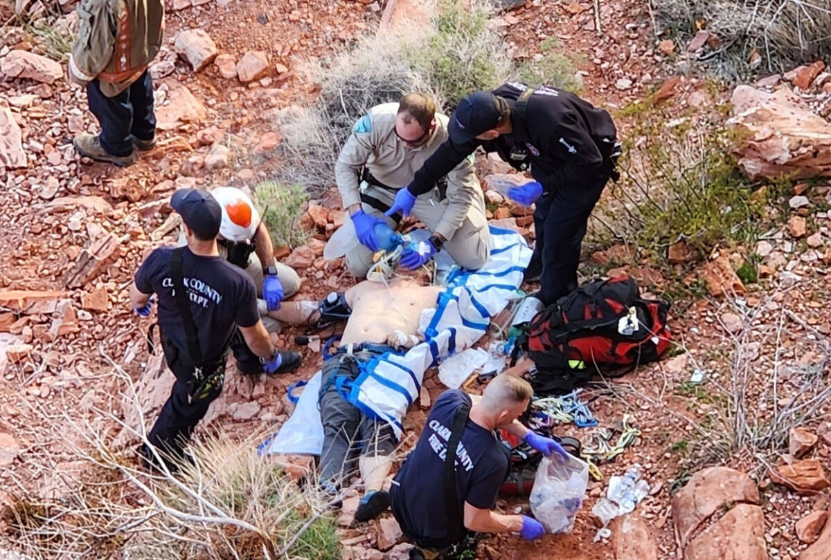 First responders assist a rappelling victim at Calico Basin at Red Rock National Recreation Are ...