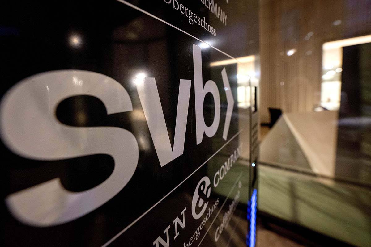A sign of a branch of the Silicon Valley Bank is pictured at an office building where the bank ...