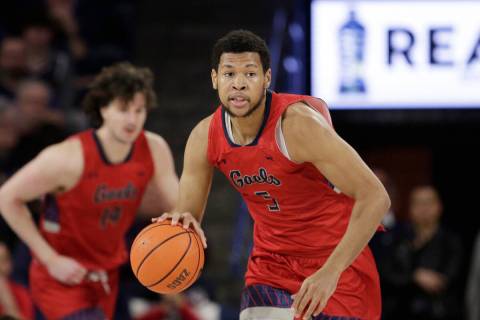 Saint Mary's forward Joshua Jefferson controls the ball during the second half of an NCAA colle ...