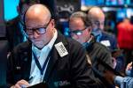 Bank stocks tumble; others rise on hopes for easier rates