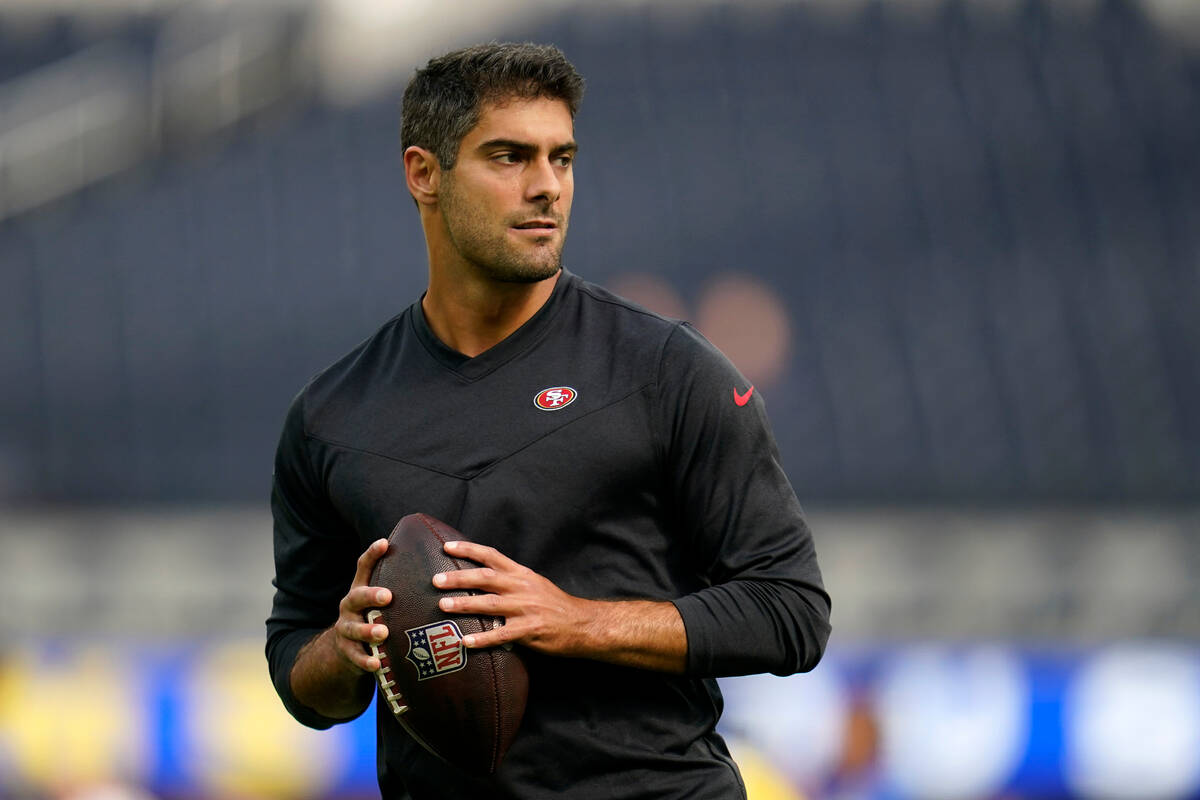 FILE - San Francisco 49ers quarterback Jimmy Garoppolo warms up prior to an NFL football game a ...