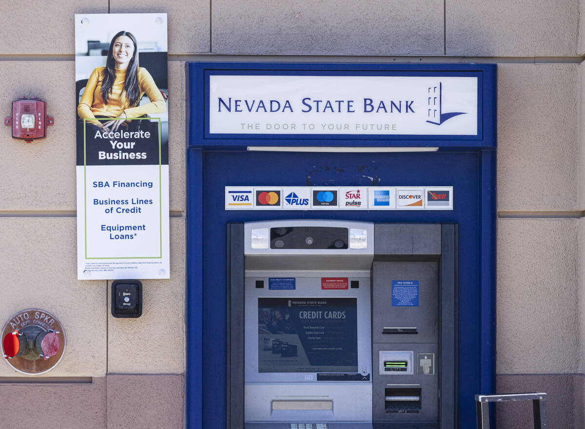 An ATM machine is shown outside of the Nevada State Bank, on Monday, March 13, 2023, in Las Veg ...