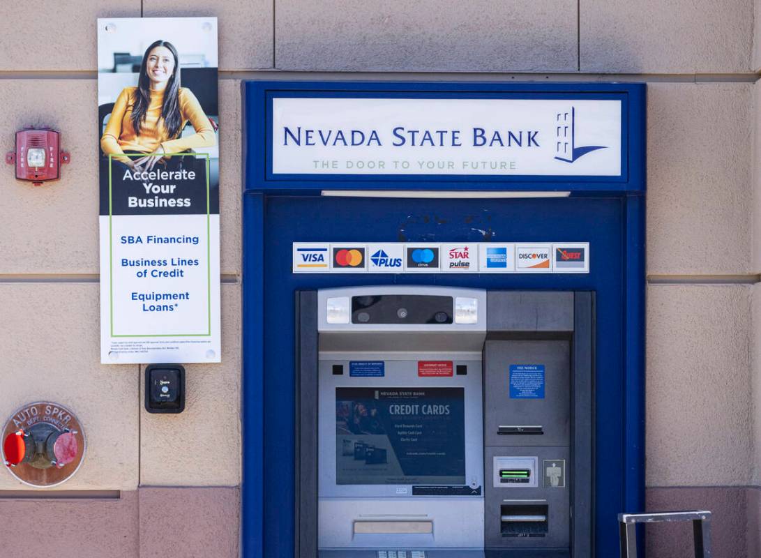 An ATM machine is shown outside of the Nevada State Bank, on Monday, March 13, 2023, in Las Veg ...