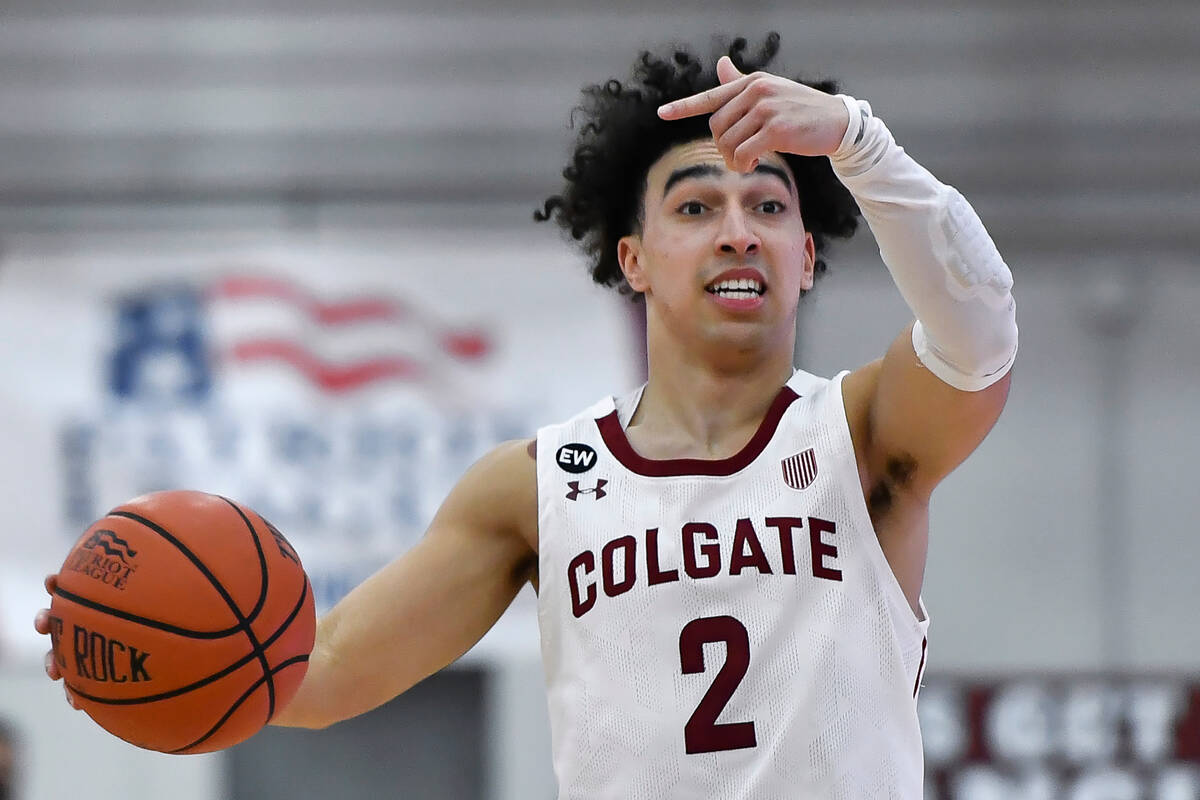 Colgate guard Braeden Smith (2) handles the ball against Lafayette during the first half of an ...