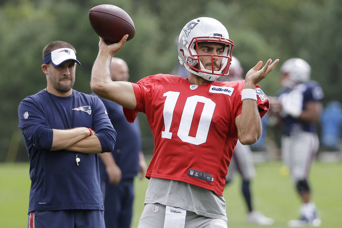 In this Sept. 7, 2016, file photo, New England Patriots' Jimmy Garoppolo (10) winds up for a pa ...