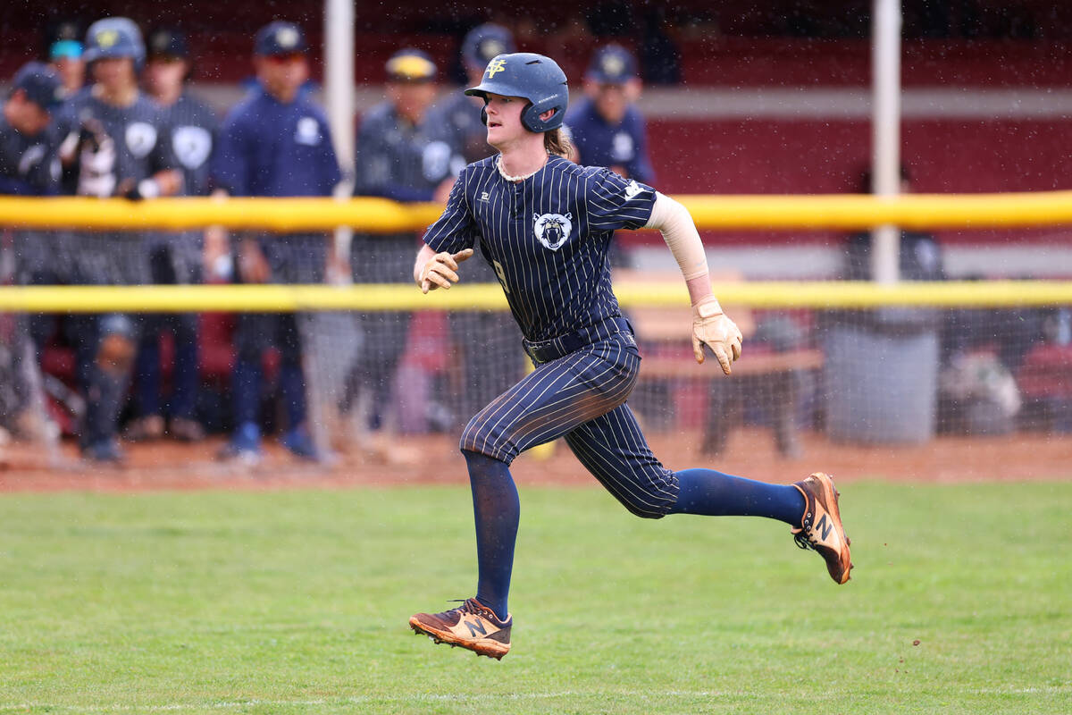 Spring Valley's Charlie Stewart (9) runs home for a run during a spring break baseball tourname ...
