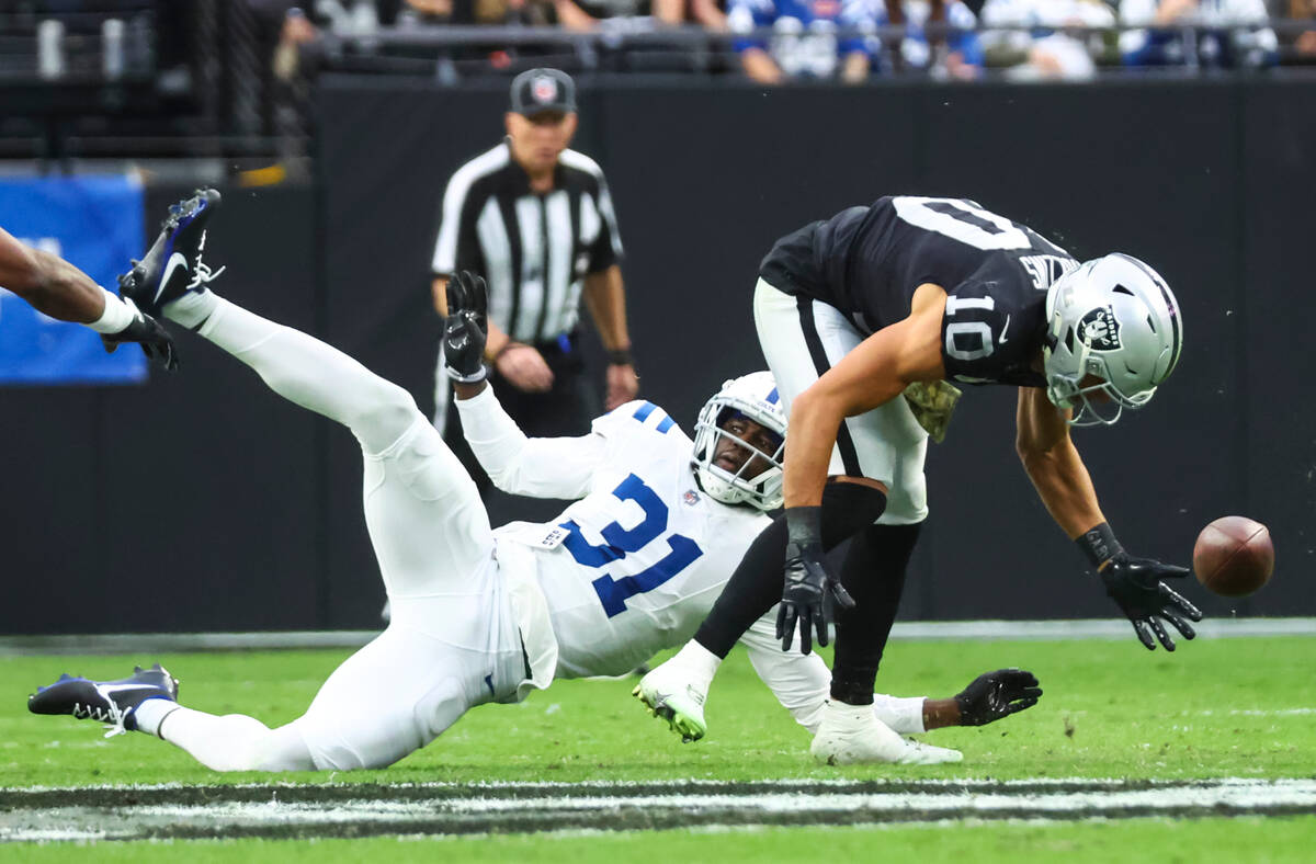 Indianapolis Colts safety Brandon Facyson (31) breaks up a pass intended for Raiders wide rece ...
