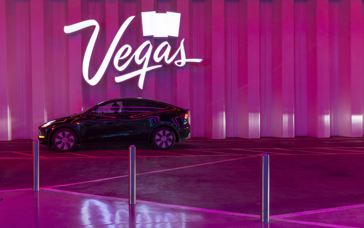 A Tesla moves through the Central Hall station underground on the Boring Company's Vegas Loop a ...