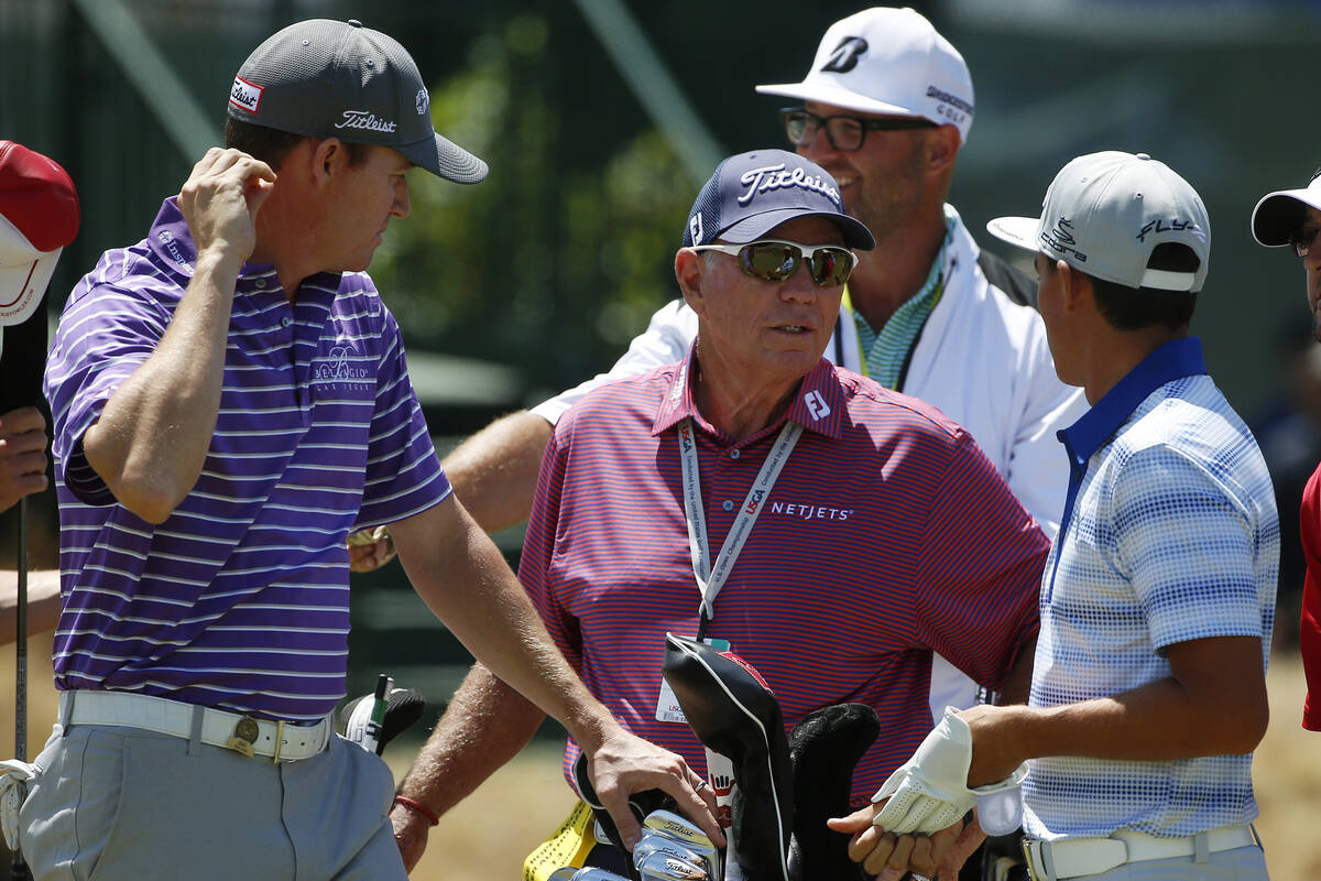 Golf instructor Butch Harmon, middle, talks with Jimmy Walker, left, and Rickie Fowler on the 1 ...