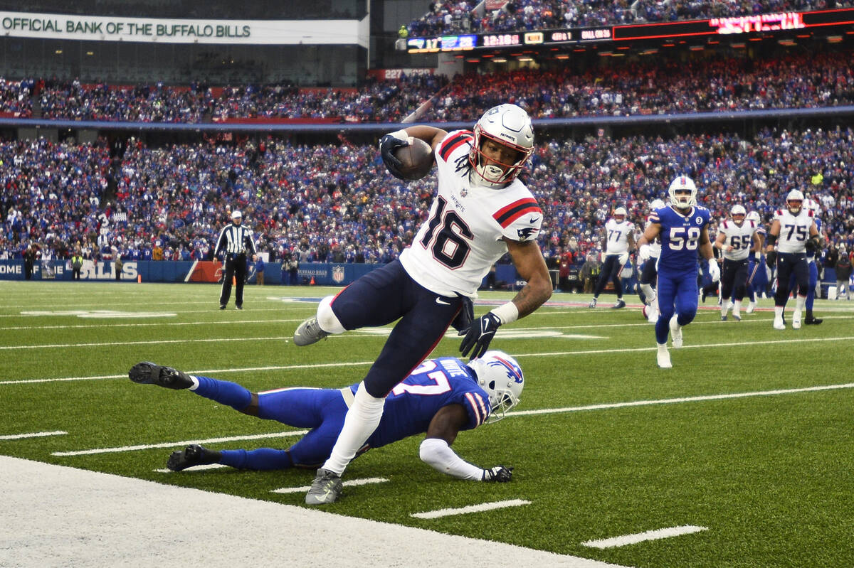 FILE - New England Patriots wide receiver Jakobi Meyers (16) coverts a fourth down against Buff ...