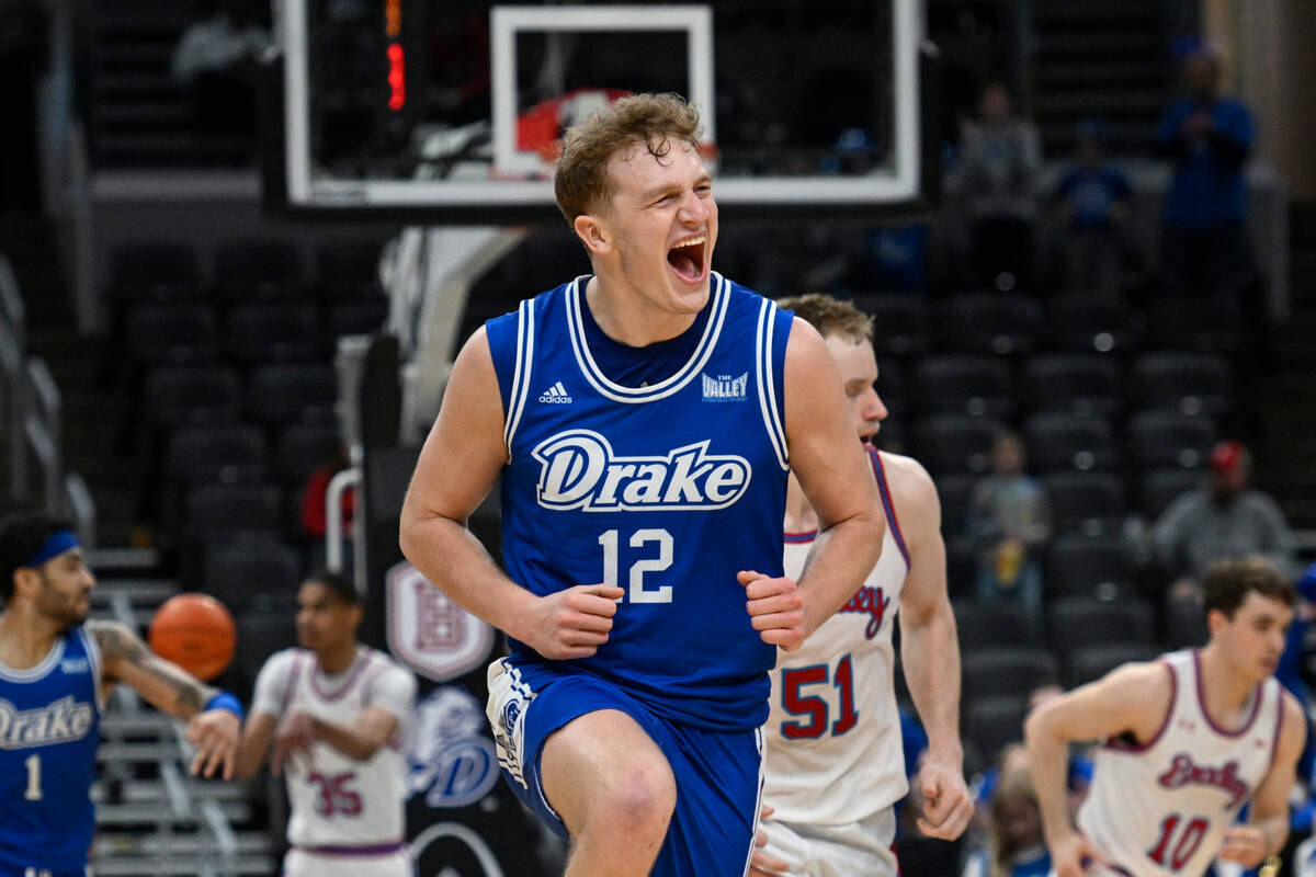 Drake guard Tucker DeVries (12) reacts after scoring a 3-point basket against Bradley during th ...
