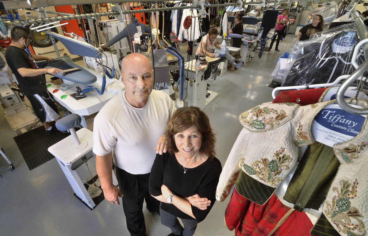 Dan and Judy Del Rossi, owners of Tiffany Couture Cleaners, are seen in the cleaning and pressi ...