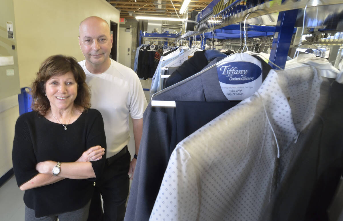 Dan and Judy Del Rossi, owners of Tiffany Couture Cleaners, are seen in the cleaning and pressi ...