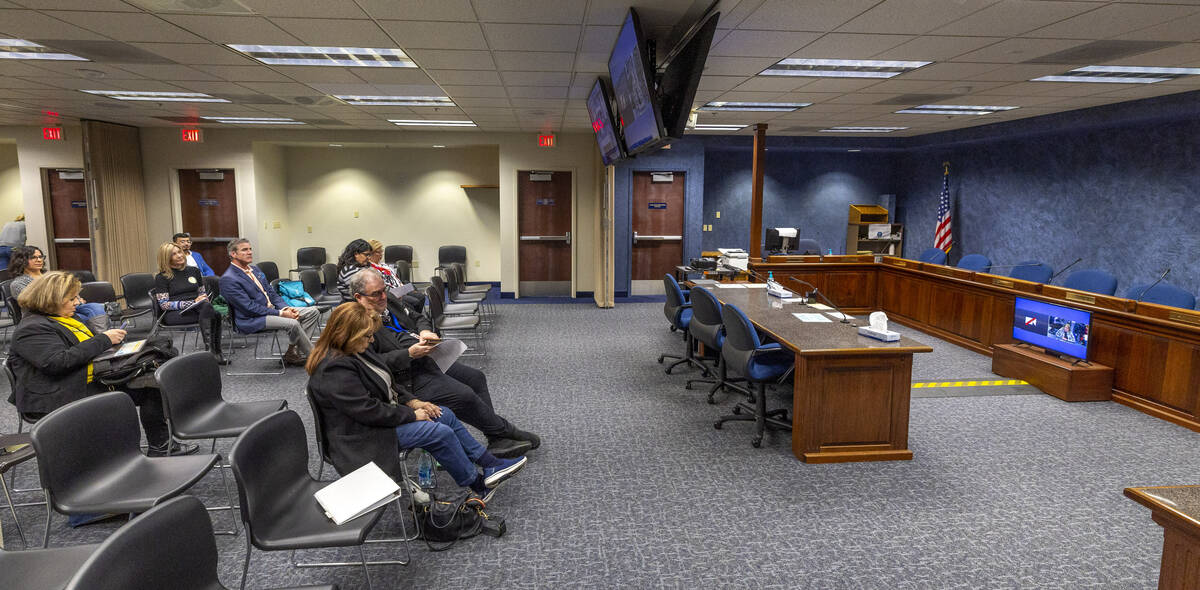Attendees listen to comments during a Nevada Health & Human Services Committee hearing on the E ...