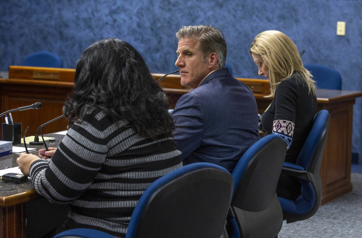 Dan Diaz looks to Hanna Olivas, left, as she speak with Lynda Brooks-Bracey awaiting her turn d ...