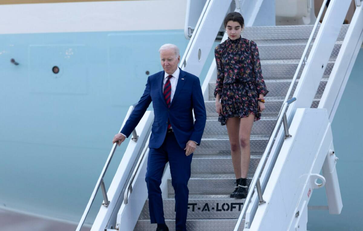 President Joe Biden and his granddaughter Natalie Biden arrive at Harry Reid International Airp ...