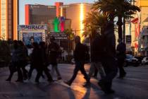 Visitors to the Strip cross Las Vegas Boulevard in November 2022 in Las Vegas. (Ellen Schmidt/L ...