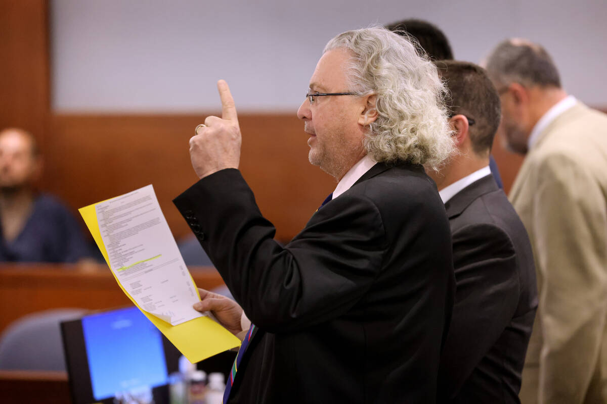 Attorney David Chesnoff, left, speaks on behalf of his client Former Raiders player Henry Ruggs ...