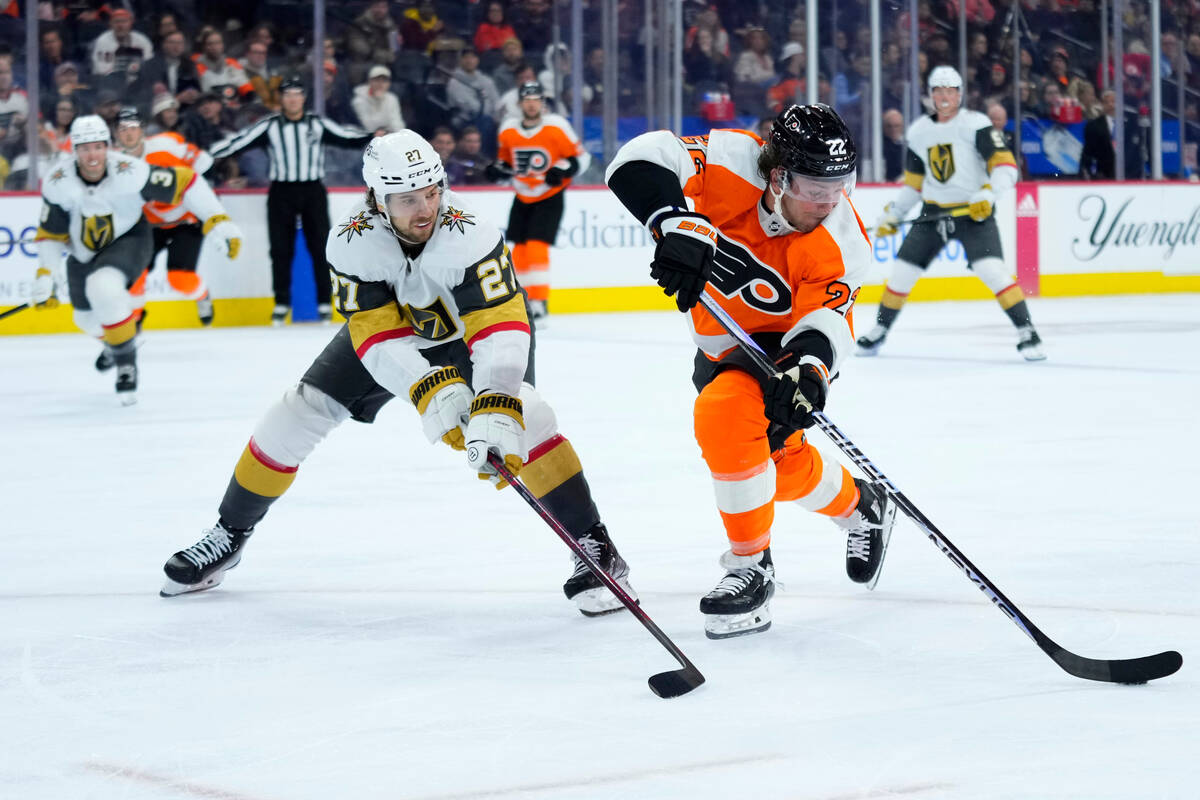 Philadelphia Flyers' Brendan Lemieux, right, tries to get past Vegas Golden Knights' Shea Theod ...